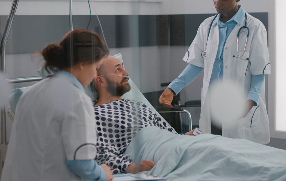 Doctor communicating with a patient and his family.