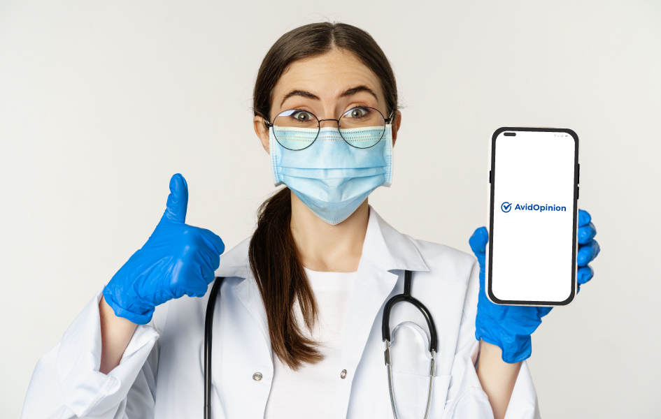 A-enthusiastic-physician-is-giving-a-thumbs-up-to-our-mobile-app-AvidOpinion-for-seamless-doctor-survey-completion